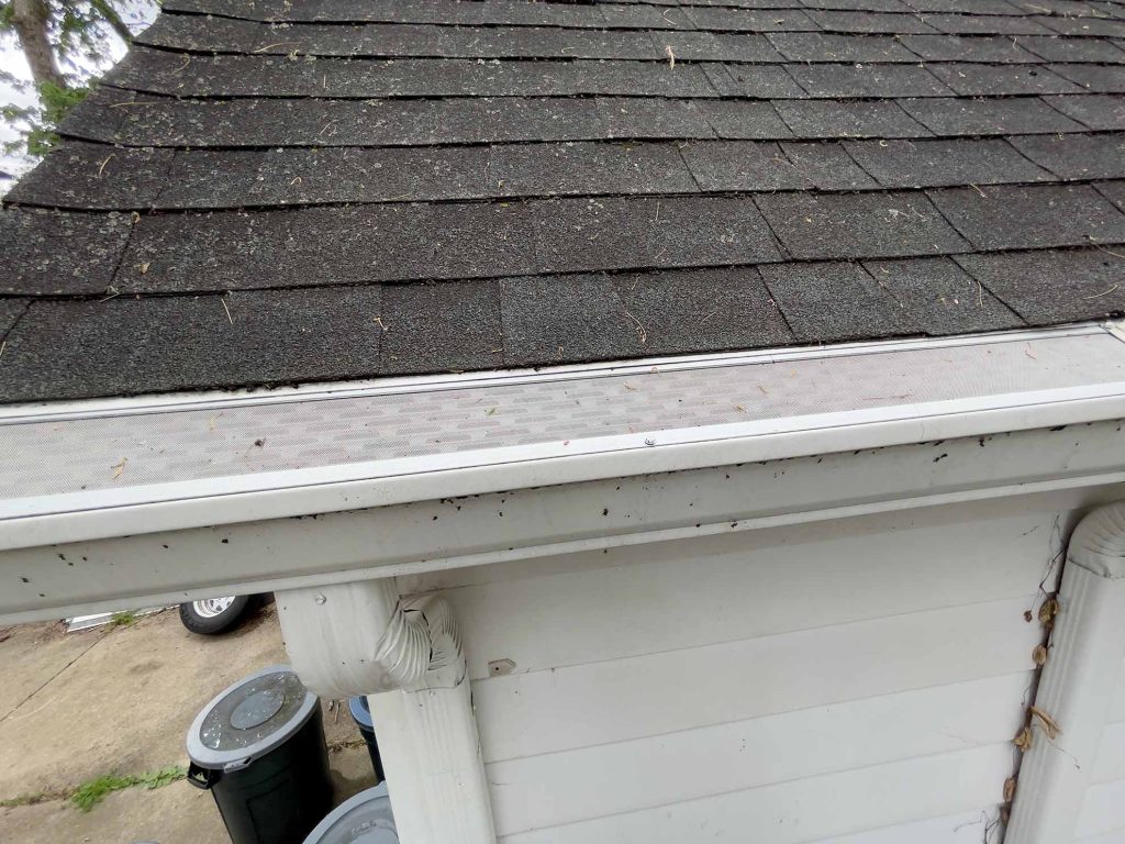 armourguard micro mesh gutter guard installed under the shingles on a garage as part of the 2024 Ultimate Gutter Guard Challenge